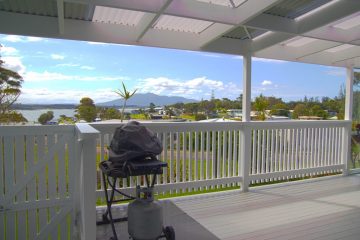 The balcony has sweeping views of Gulaga mountain and Horseshoe Bay